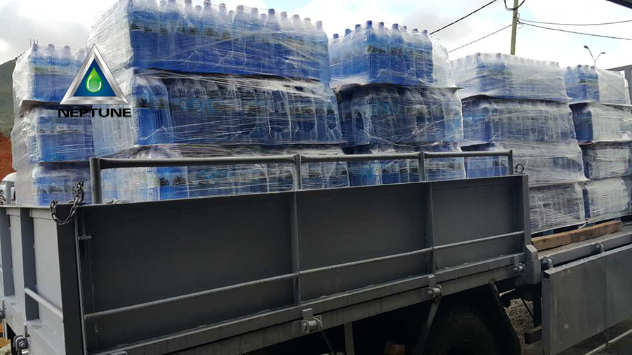 bottle water plant loading wrap bottle water into truck for freight to